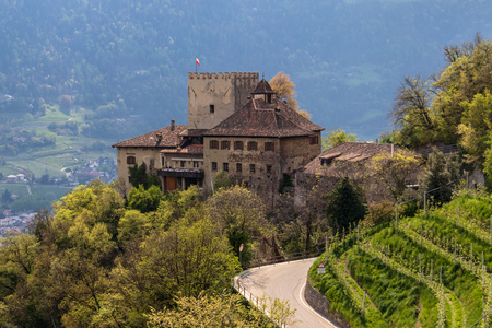 Panorama of Castle Thurnstein between a green landscape of Meran. Tirol Village, Province Bolzano, South Tyrol, Italy.のeditorial素材