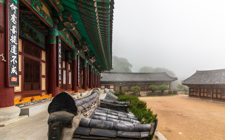 Inside Korean Buddhistic Temple Daeseongam, Great Saint Hermitage, near Beomeosa on a foggy day. Located in Geumjeong, Busan, South Korea, Asia.のeditorial素材