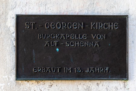 Entrance Sign of the Church, Sankt Georgen Kirche in Schnena. Scena, South Tyrol, Italy. Europe.のeditorial素材