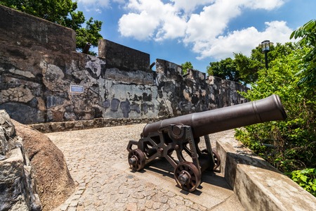 Replica cannon and defense wall of Mount Fortress, Fortaleza do Monte, between Nature. Santo AntÃ³nio, Macao, China. Asia.のeditorial素材