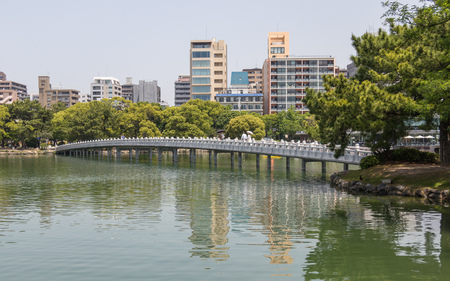 Ohori Park pond with bow brigde, Island and background. Chuo-ku, Fukuoka, Japan, Asia.のeditorial素材