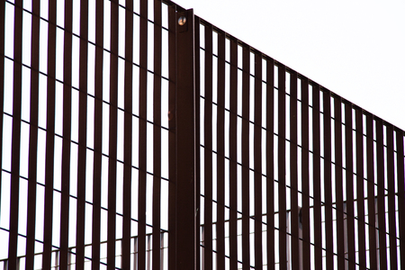 Close up of a rusty metal grate creating a nice grid pattern textureの写真素材