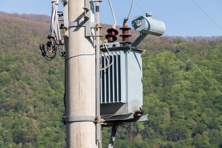 large transformer, the transformer weights on the electric post, power supplyの写真素材