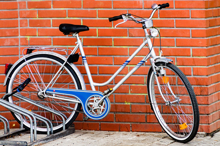 Bicycle parking, bicycles next to the houseの写真素材