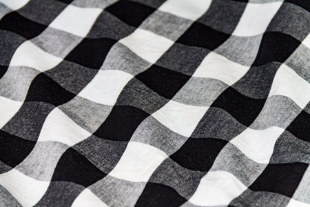 Texture of a crumpled shirt, white black cloth for a background