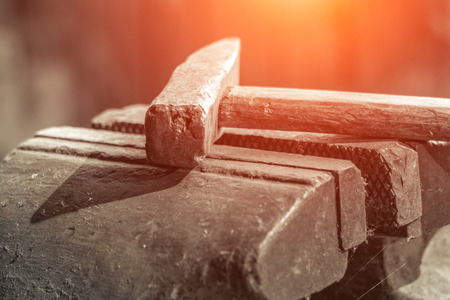 old hammer on the vise, metalworking industryの写真素材