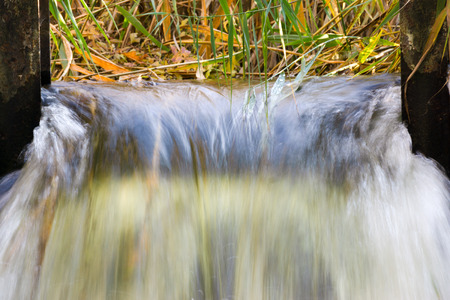 water closeup, background image of a waterfall, rest and travelの写真素材