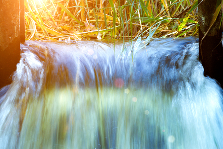 water closeup, background image of a waterfall, rest and travelの写真素材