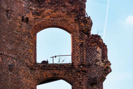 Ruins from an old brick building against the sky. Empty windowsの写真素材