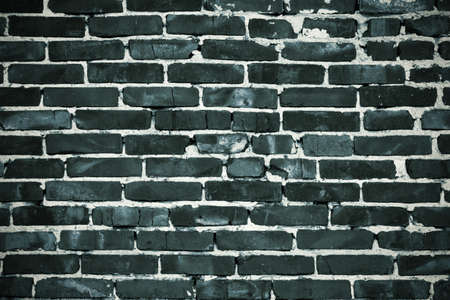 Dark brick wall for background. beautiful background for text. Vignettingの写真素材