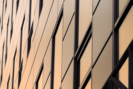 Office building windows background. Glass facade of an office buildingの写真素材