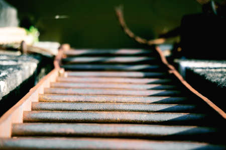 Old rusty stairs close up. Descend to the bottomの写真素材