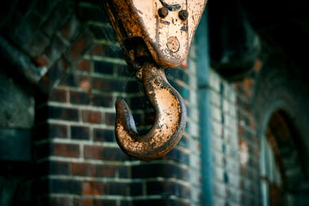 The hook from the winch hangs on the iron ropesの写真素材