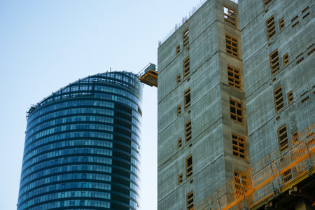 Crane and construction structures. Construction of a new office centerの写真素材