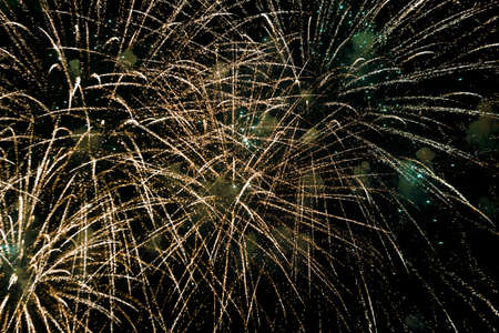 Celebration of the New Year fireworks. Colorful fireworks in the sky. Many bright fireworksの写真素材