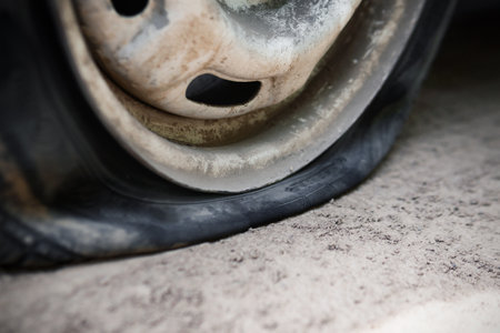 Flat tire. Punched wheel on a car. Close-upの写真素材