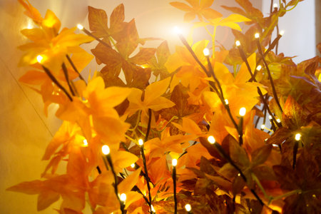 Golden garland on the flowers. christmas backgroundの写真素材