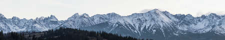 High mountains under snow in the winterの写真素材