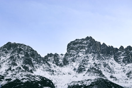 triangle shaped snow cap mountain in the Polish Tatrah