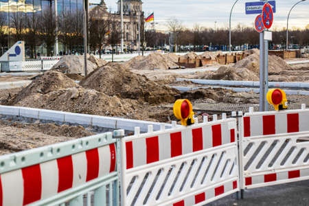 Street repairs in the city, Large piles of earthの写真素材