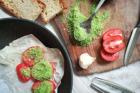 Italian caprese salad with red tomatoes and herbsの写真素材