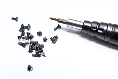 unscrewed the bolts using the screwdriver with various bits