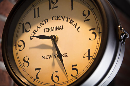 Old analog clock, close-up on the dial