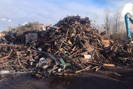 a large pile of scrap metal awaits processing, metal sortingの写真素材