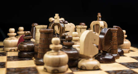 chess on a black background, a lot of chess piecesの写真素材