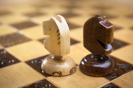 wooden chess, there are chess pieces on the boardの写真素材