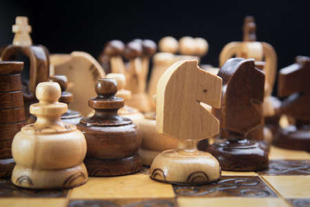 wooden chess, there are chess pieces on the boardの写真素材