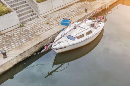 small boat moored at the pier, yachtの写真素材