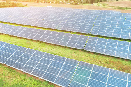 Solar panels against deep blue sky, alternative solar energy