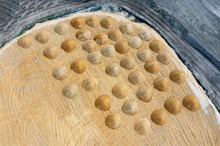leveling the ground. empty construction site of a residential area with a pile of sand. Aerial...