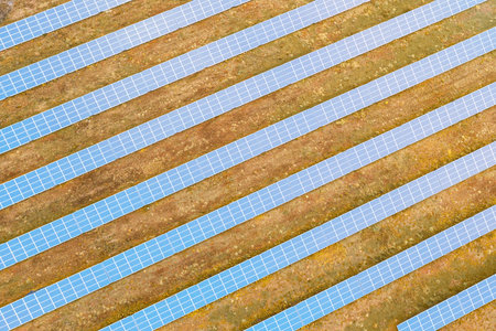 Solar panels against deep blue sky, alternative solar energy