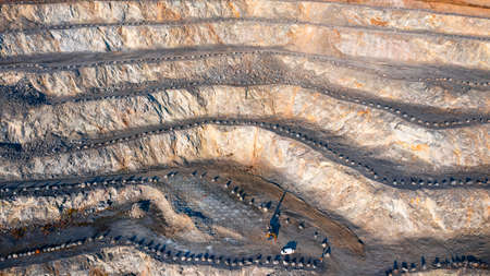 aerial view of the interior of a deep stone quarry, large rocksの写真素材