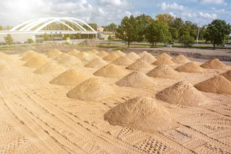 leveling the ground. empty construction site of a residential area with a pile of sand. Aerial photographyの写真素材