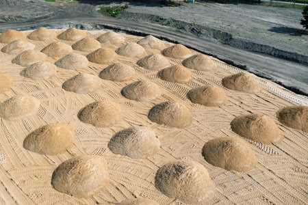 leveling the ground. empty construction site of a residential area with a pile of sand. Aerial...