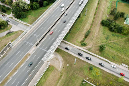 Aerial view of the freeway with various connections. Vehicles travel on the roads. Polandの写真素材
