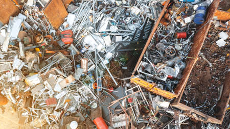 large pile with old rusty metal, sorting and processing of metalの写真素材