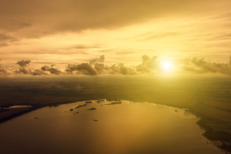 the sun sparkles over the lake in the steppeの写真素材