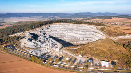 aerial view of the inside of a deep stone quarry in Polandの写真素材