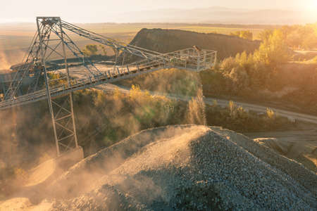 Stone crushing machine. Falling stones in the quarryの写真素材