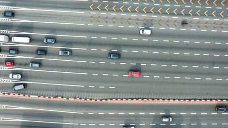 Aerial view of the freeway with cars driving along it