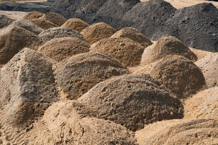 leveling the ground. empty construction site of a residential area with a pile of sand. Aerial photographyの写真素材