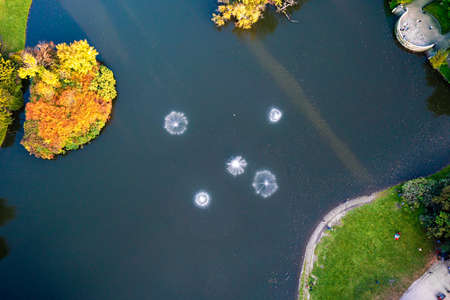 Top view of the fountains in the middle of the lakeの写真素材