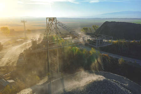 Stone crushing machine. Falling stones in the quarryの写真素材