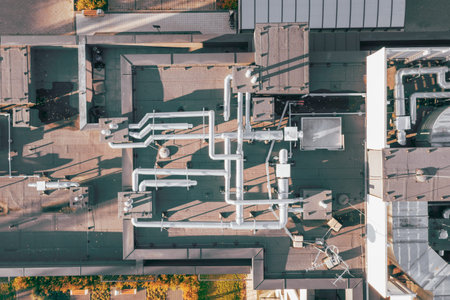 Ventilation and air conditioning system on the roof of the house. View from above