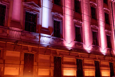 Beautiful illuminated building at night in Germany. Historic building is brightly lit, close-upの写真素材