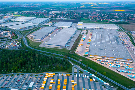 Aerial view of a logistics park with a warehouse. Online store warehouses, logistics sorting...